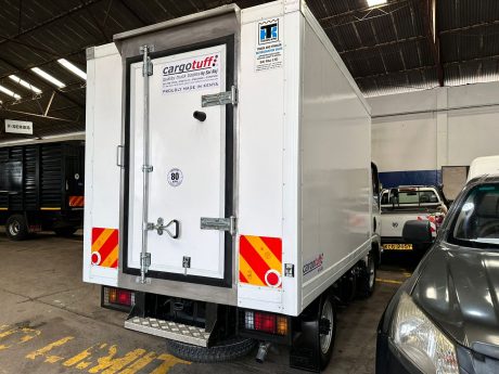 Isuzu NLR77E with fully enclosed cargo body